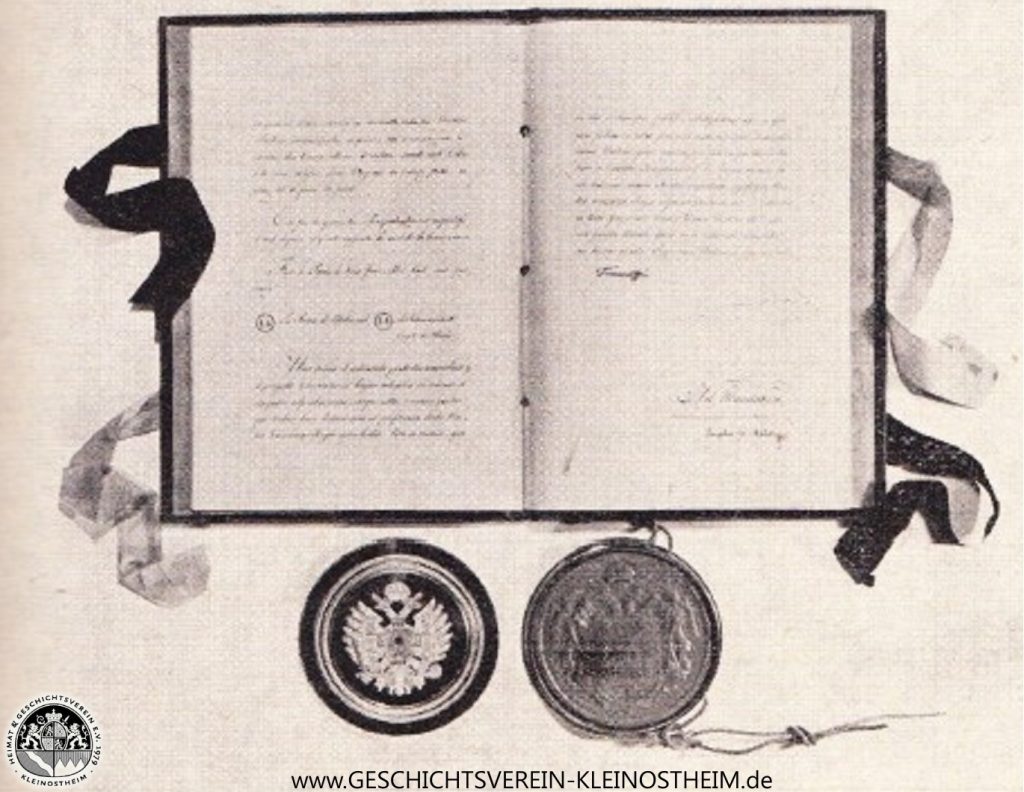 Das Foto zeigt die österreichische Ratifikationsurkunde zum Pariser Vertrag vom 3. Juni 1814, ausgestellt zu Wien, 24. Juni 1814. Infolge des Pariser Vertrages gehörte Aschaffenburg (und natürlich auch Kleinostheim) nun zu Bayern.