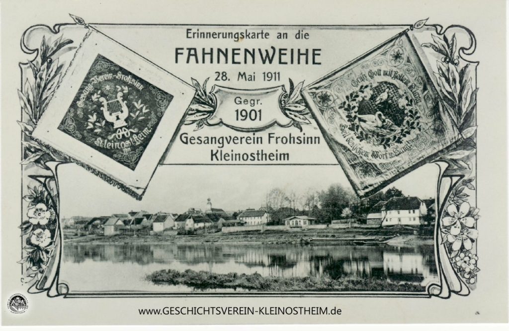 Anlässlich der Fahnenweihe des Gesangvereins Frohsinn 1911 wurde eine eigene Postkarte herausgegeben. Das Foto zeigt das Mainufer am noch unregulierten Fluss, denn das erste Wehr mit Schleuse wurde erst 1917 fertiggestellt.